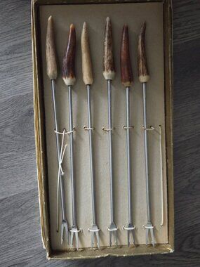 Vintage Fondue fork set features handles crafted from deer antler